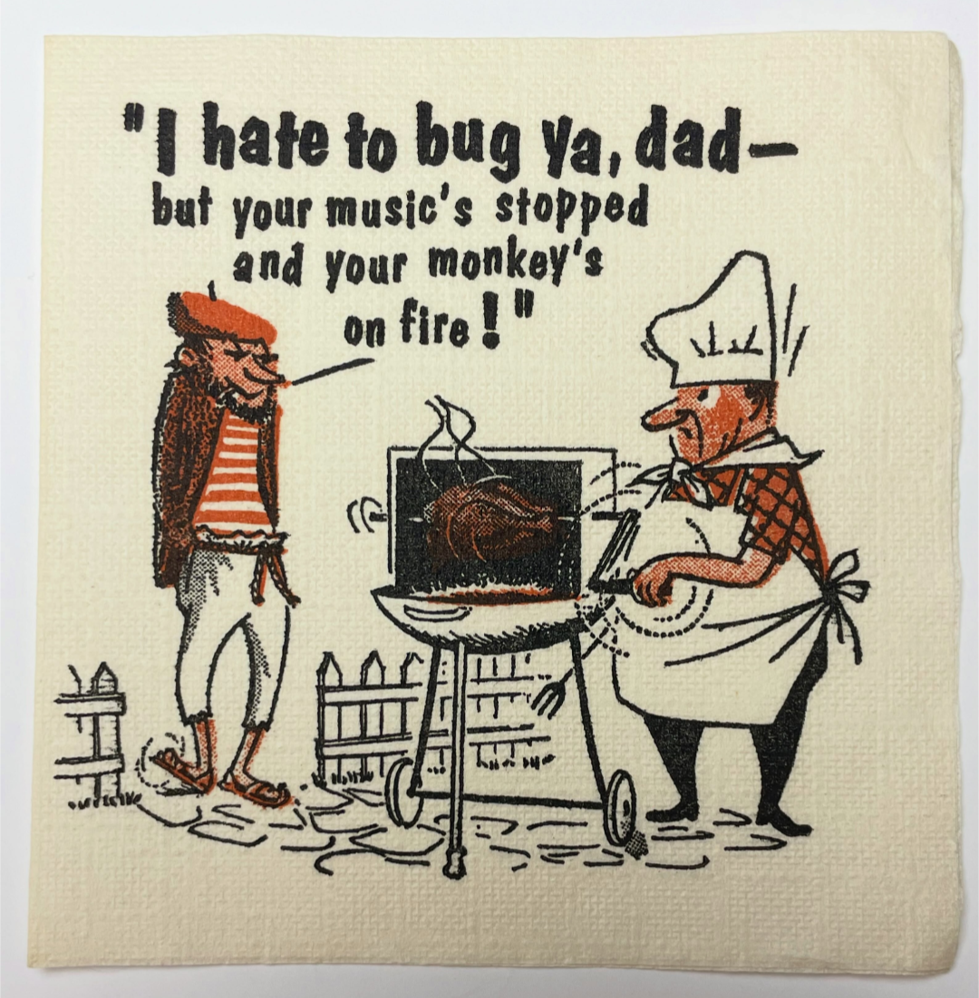 Photograph of an old drink coaster with a cartoon in mid-century American style on it. A stereotypical beatnik addresses a stereotypical suburban man tending a grill, cranking away at a rotisserie chicken: 'I hate to bug ya, dad, but your music's stopped and your monkey's on fire!'