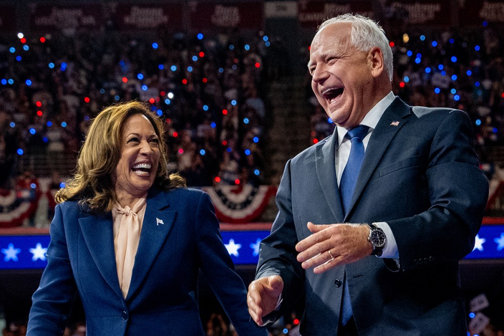 Harris and Walz, on-stage together, looking joyful.