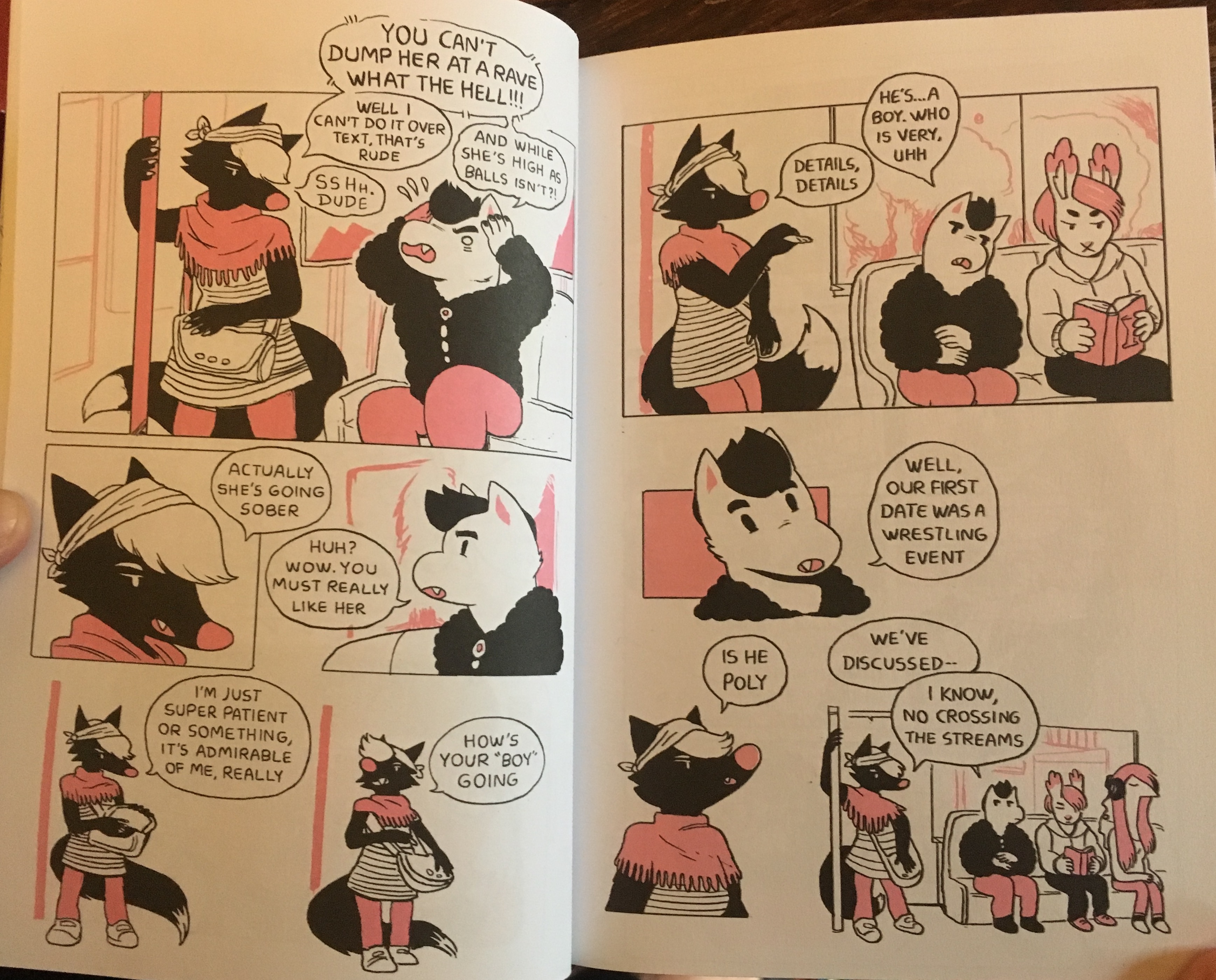 A photograph of two pages from 'Little Teeth', depicting two funny-animal characters, a fox girl and a wolf boy, having a conversation in a subway car about impending relationship disaster.